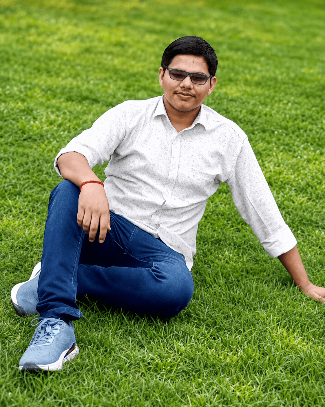 Aviral Singh sitting outdoors